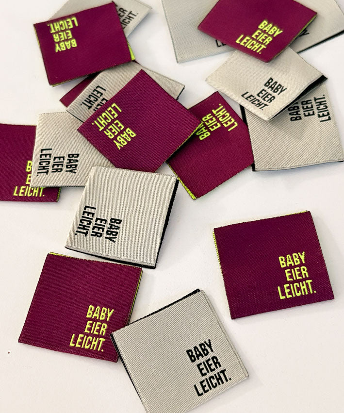 Webetikett 3x3 cm BABYEIERLEICHT 2 Fbn Teaser 1